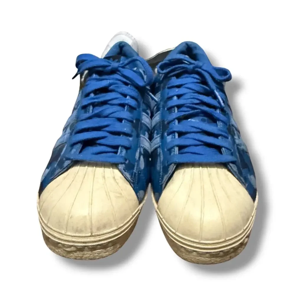 A Bathing Ape x Undefeated x adidas Superstar 80 